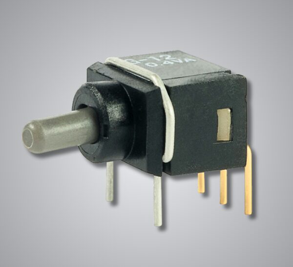 Internal view of G Series ultra-miniature toggle switch mounted at a right angle on a PCB inside a secure communication device.