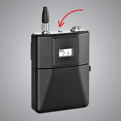 G Series ultra-miniature toggle switch mounted in a body-worn transmitter used for secure field communication.